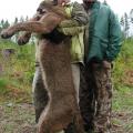 Chris and son Ed with Chris's big spring cougar on a cougar / bear combo hunt.